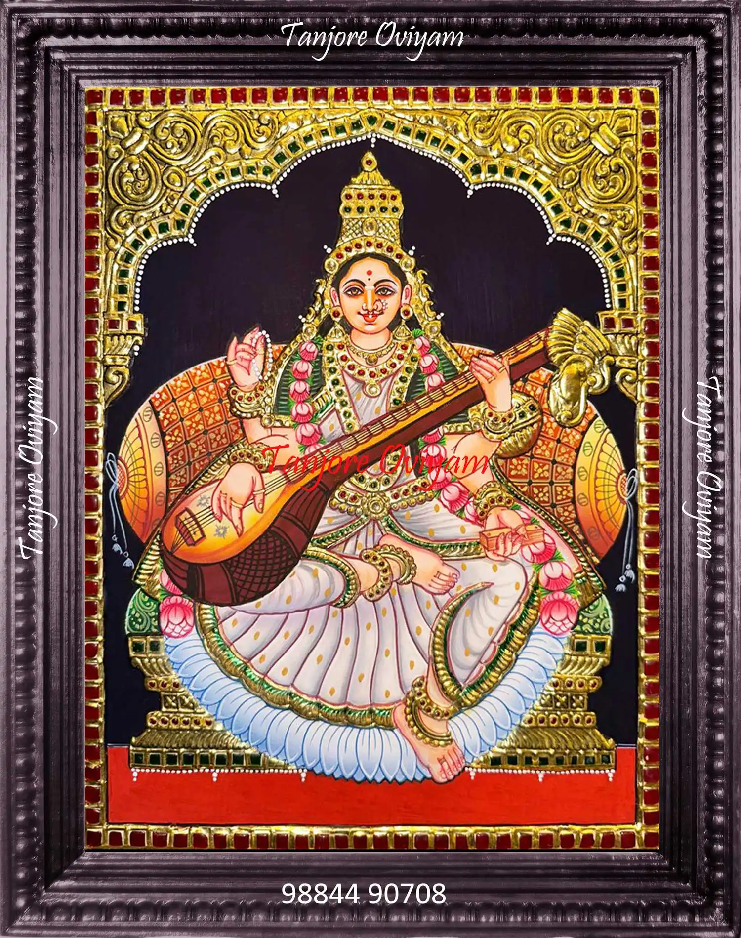 Handcrafted Saraswathi Devi Tanjore painting with veena, lotus and gold foil detailing